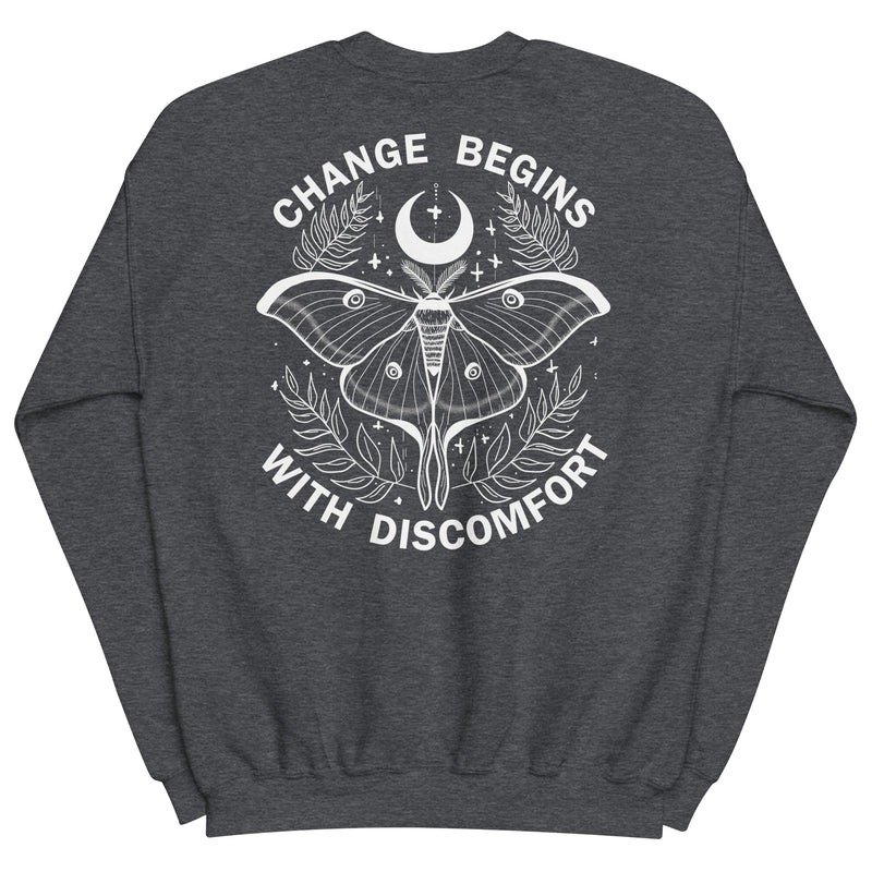 warm unisex sweatshirt in the colour dark heather on the back is a big white print image of a lunar moth and the words change begins with discomfort