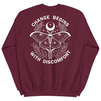 warm unisex sweatshirt in the colour maroon on the back is a big white print image of a lunar moth and the words change begins with discomfort