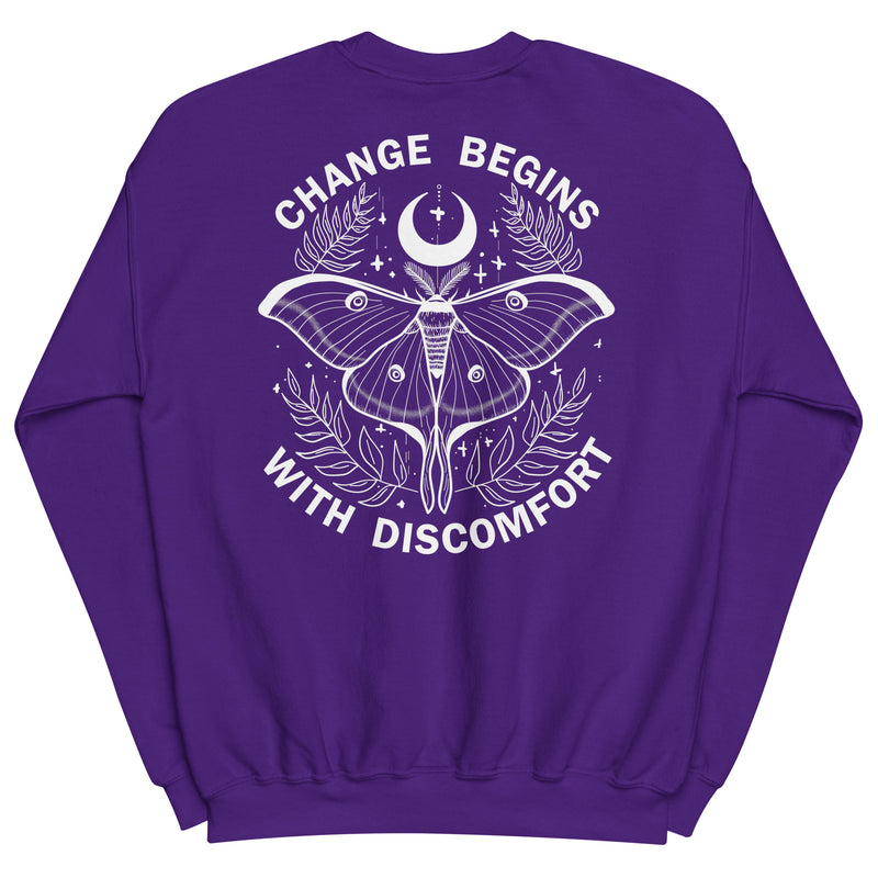 warm unisex sweatshirt in the colour purple on the back is a big white print image of a lunar moth and the words change begins with discomfort